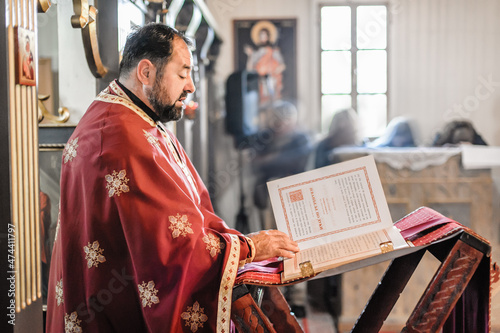 Religious priest during church service Fototapeta