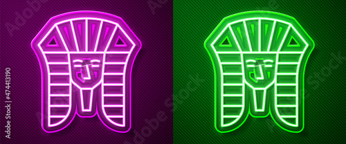 Glowing neon line Egyptian pharaoh icon isolated on purple and green background. Vector