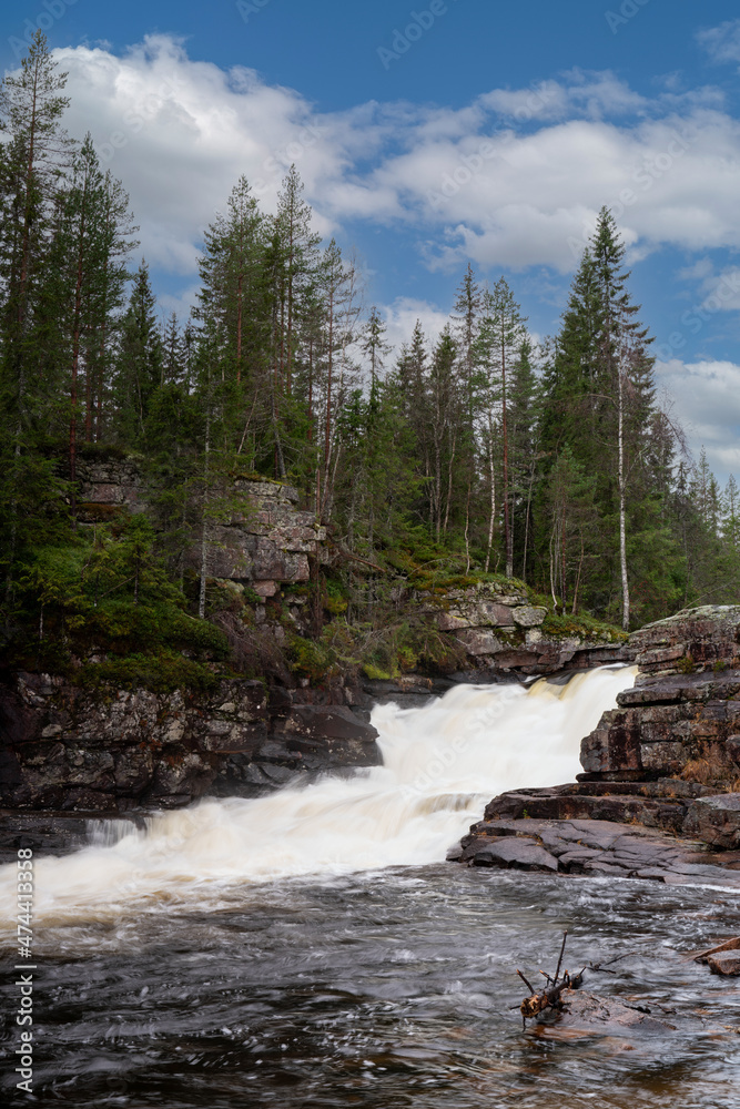 Gåfossen waterfall near the village of Maura in Norway Gåfossen waterfall near the village of Maura in Norway