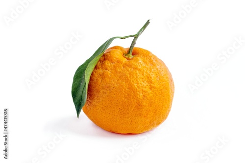Fresh mandarin isolated on white background.