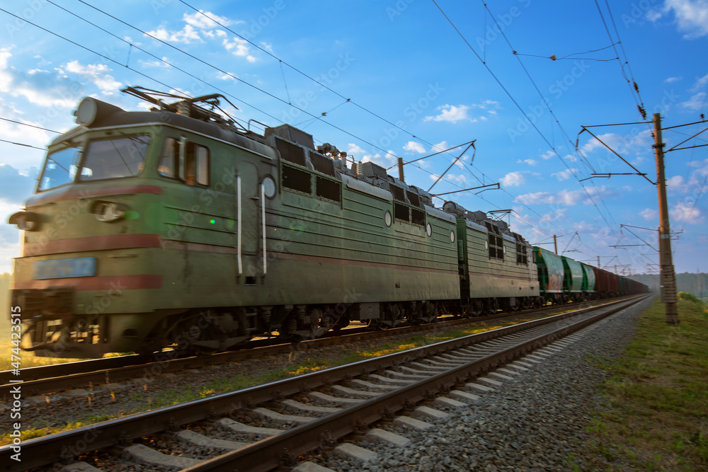 Big passenger train at dawn, selective focus Big passenger train at dawn, selective focus