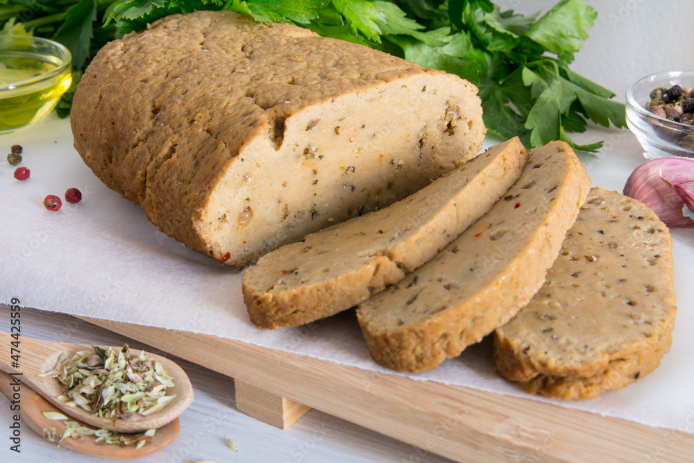 seitan or vegan meat sliced with spices such as oregano, pepper, garlic, and parsley. seitan or vegan meat sliced with spices such as oregano, pepper, garlic, and parsley.