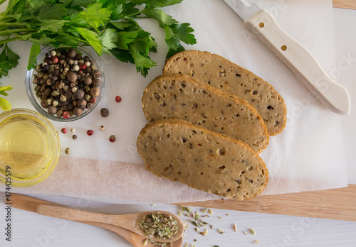 seitan or vegan meat sliced with spices such as oregano, pepper, garlic and parsley. Top view