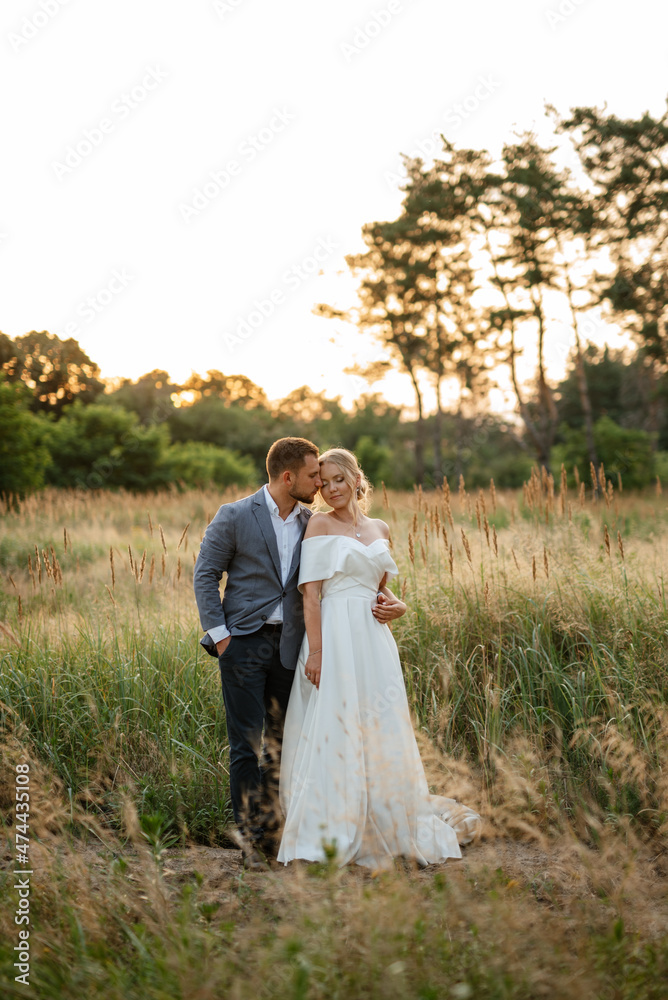 bride and groom on in the woods bride and groom on in the woods