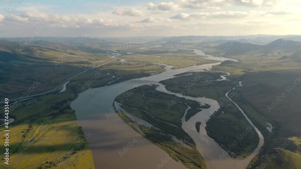 clouds float over the river valley