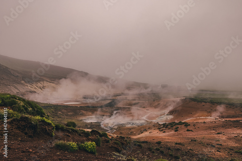Empty geothermal Krysuvik area on Reykjanes peninsula in Iceland on early summer morning. Visible sulphur rising from the ground.