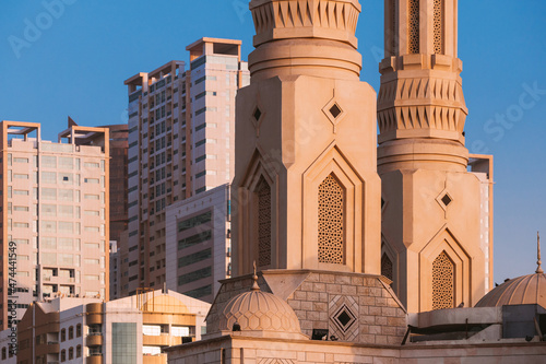 Al Remeila Mosque, New Residential Multi-storey Houses In Ajman, United Arab Emirates. Close Up Details photo