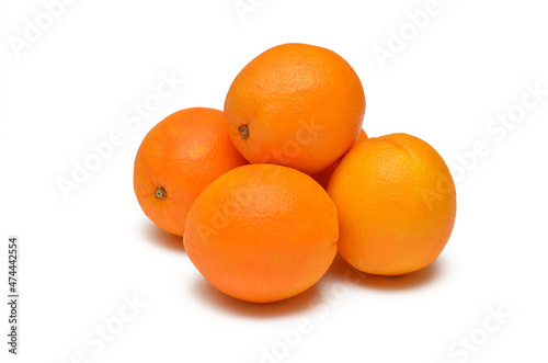 whole fresh oranges isolated on white background