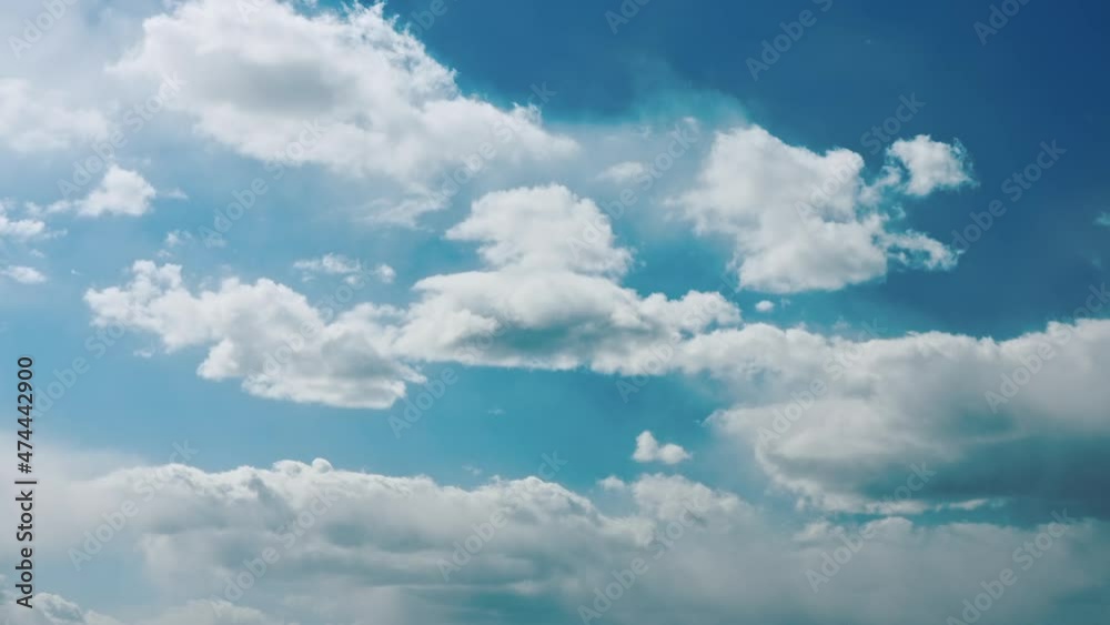 Cloudy Sky With Fluffy Clouds. Natural Background Cloudy Sky With Fluffy Clouds. Natural Background