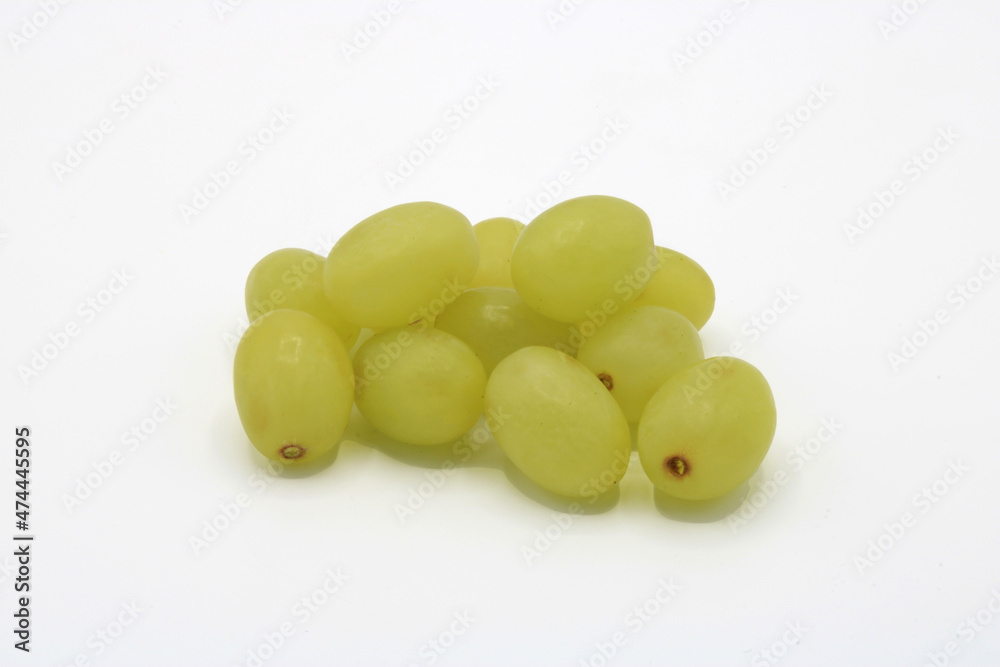 Close-up of twelve grapes together isolated on a white background Close-up of twelve grapes together isolated on a white background