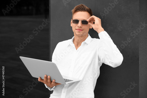 Handsome young man in sungl...