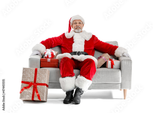 Santa Claus sitting on sofa...