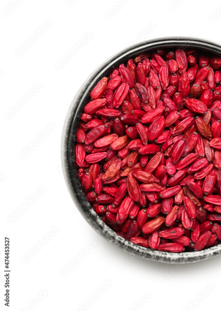 Bowl with dried barberry on white background Bowl with dried barberry on white background