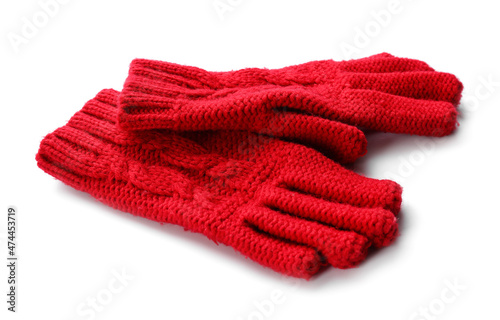 Red warm gloves on white background, closeup