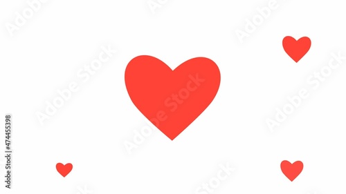 Red heart flying on white background, symbol of true love.