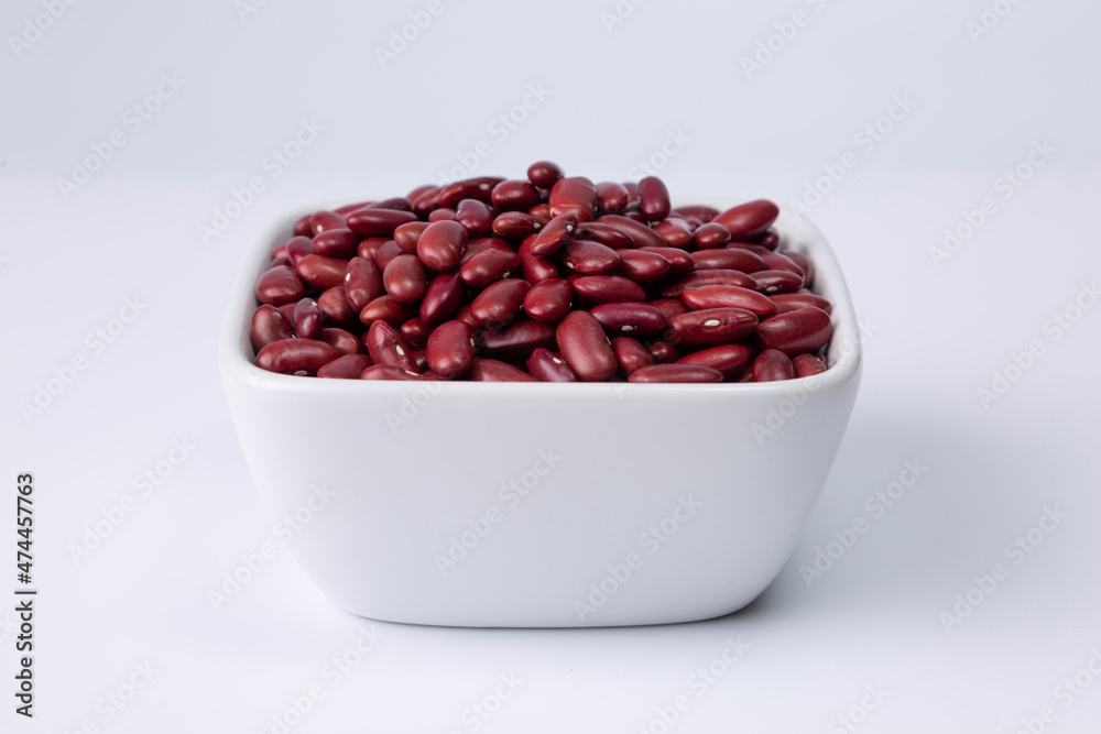 red kidney bean in white bowl on white background studio shot red kidney bean in white bowl on white background studio shot