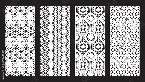 Bundle of lace mesh fabric.  Black and white textures.