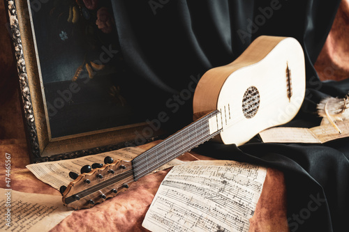 Musical still life in the Renaissance style with renaissance guitar