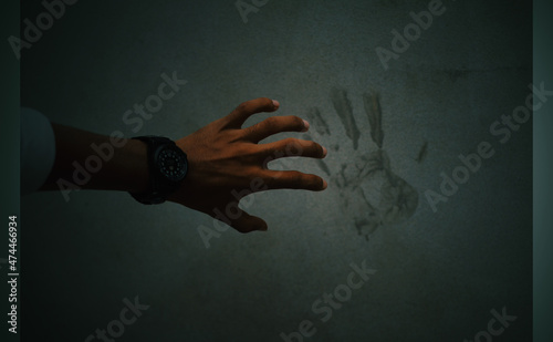 handprint on wall and touch the wall