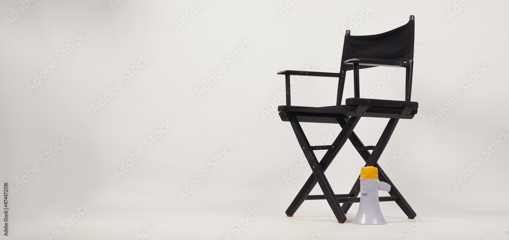 Black director chair and Clapper board with yellow megaphone on white background Black director chair and Clapper board with yellow megaphone on white background