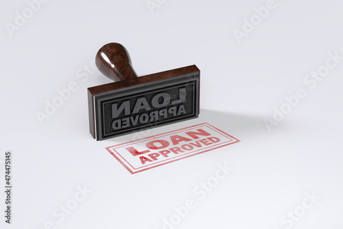 Фотография Rubber stamping that says Loan Approved on White Background.