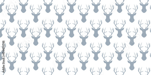 Reindeers  vector seamless repeating pattern background. Trendy for fabric, texitle print, wallpaper, background, wrapping or invitation cards, packaging.

