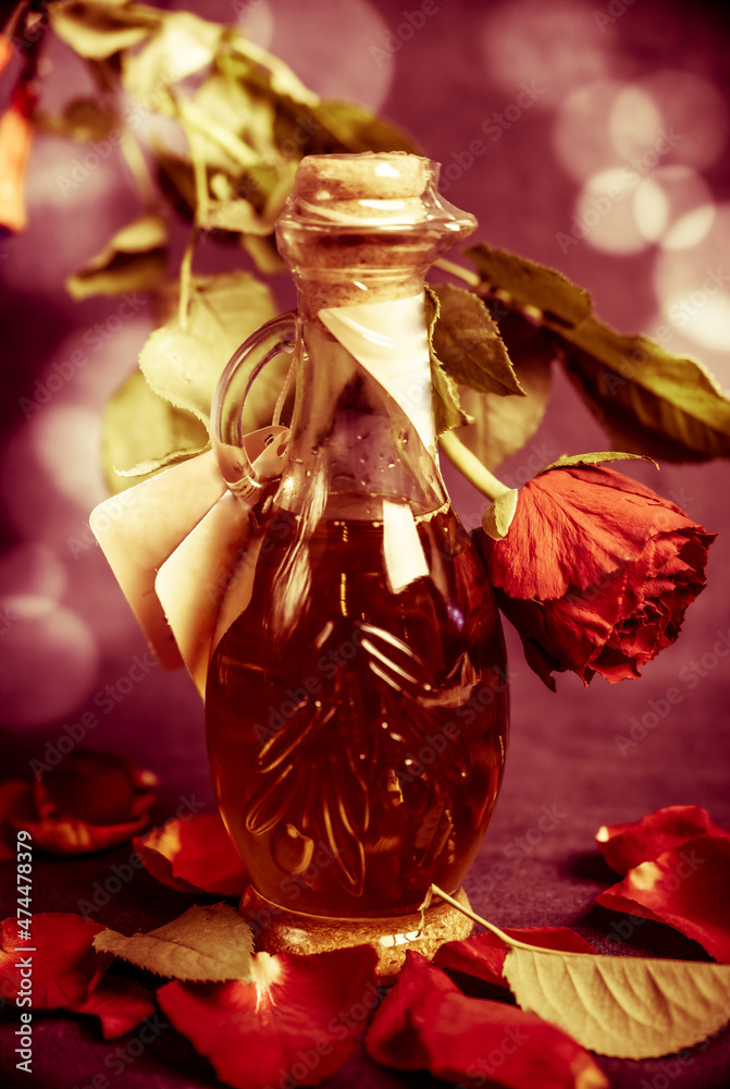 Rose with rose petals and olive oil. Decoration for Valentine's Day, International Women's Day, greeting cards, Mother's Day, food photography.