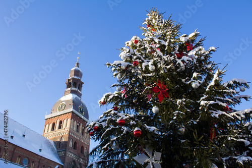 Close-up on Christmas tree and cathedral on a winter day. Riga. Latvia.The Baltic States. photo