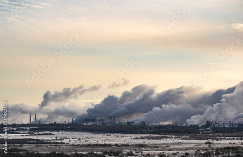 The destructive effect on the nature and human health of toxic emissions from heavy industry. Ecological concept.