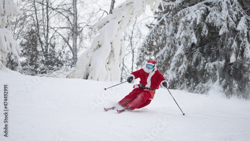 Santa Claus skiing downhill