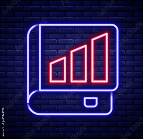 Glowing neon line Financial book icon isolated on brick wall background. Colorful outline concept. Vector
