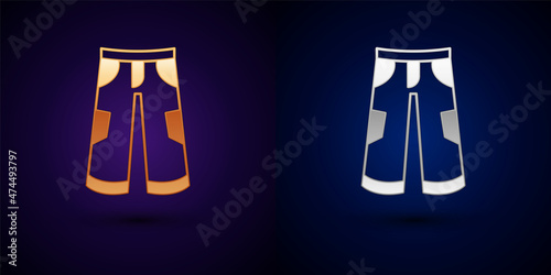 Gold and silver Pants icon isolated on black background. Trousers sign. Vector