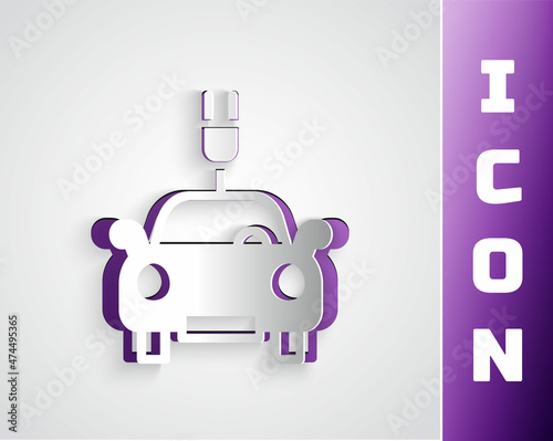 Paper cut Electric car and electrical cable plug charging icon isolated on grey background. Renewable eco technologies. Paper art style. Vector
