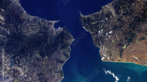 Strait of Gibraltar border between Europe and Africa, Mediterranean sea and Atlantic ocean aerial satellite view from space, sunrise animation. Based on image furnished by Nasa
