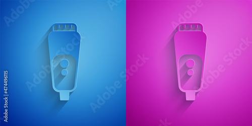Paper cut Electric razor blade for men icon isolated on blue and purple background. Electric shaver. Paper art style. Vector