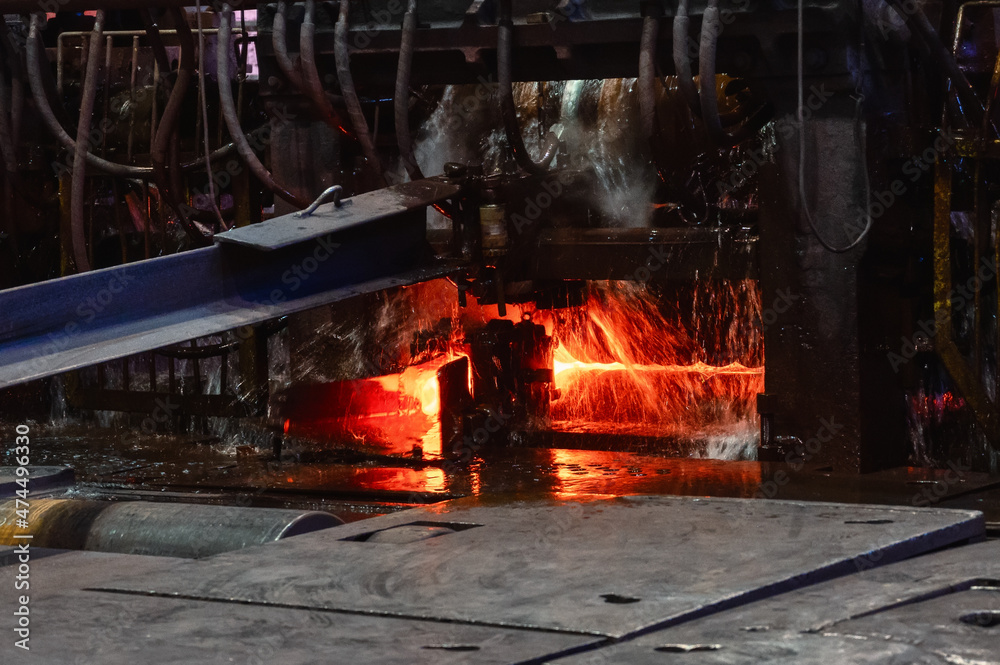 The rolling mill in operation. Manufacturing of hot rolled steel