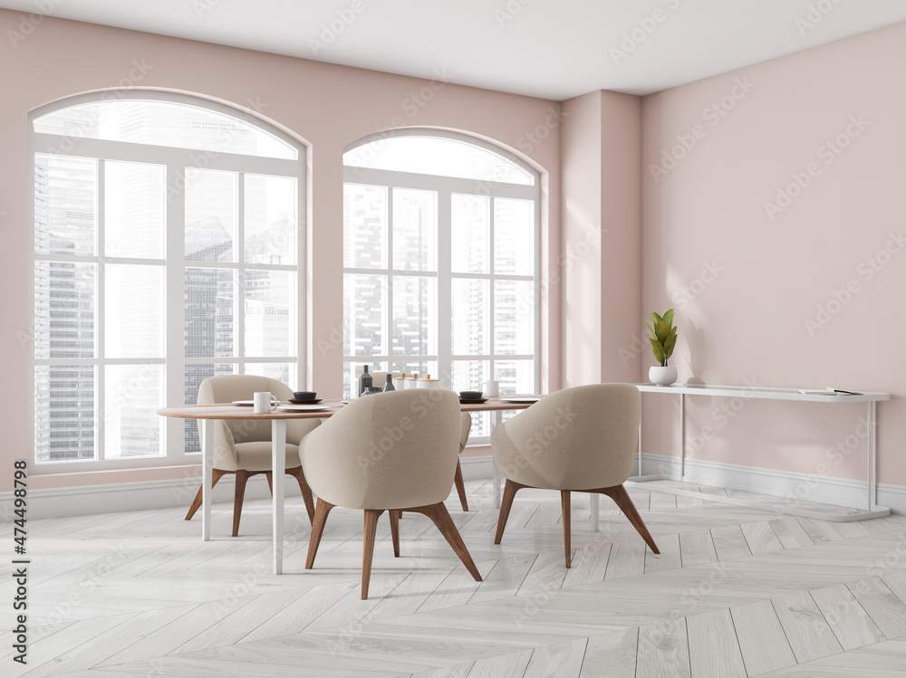 Fototapeta premium Light pink and white dining room with arch windows