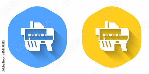 White Futuristic space gun blaster icon isolated with long shadow background. Laser Handgun. Alien Weapon. Circle button. Vector