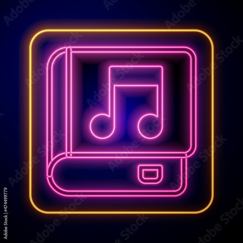 Glowing neon Audio book icon isolated on black background. Musical note with book. Audio guide sign. Online learning concept. Vector