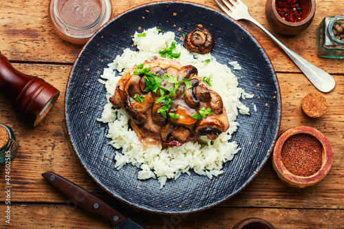 Chicken breast with marsala sauce and rice