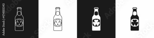 Set Beer bottle with clover trefoil leaf icon isolated on black and white background. Happy Saint Patricks day. National Irish holiday. Vector