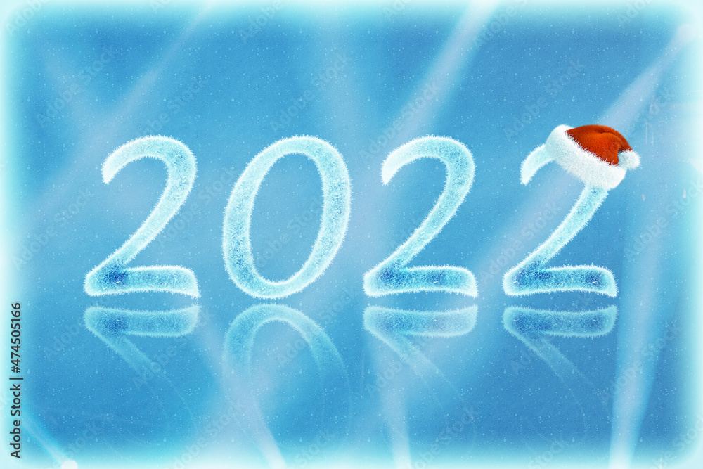 The numbers of snow in Christmas hat with rays of light (2022, New Year card - concept).