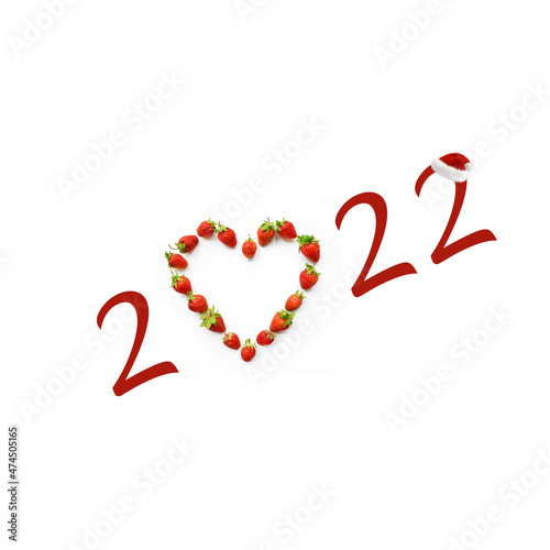 Obraz na płótnie Christmas motif with heart shaped strawberries (2022, New Year card - concept). w salonie