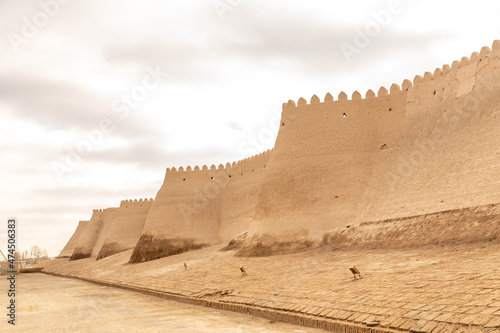 The wall of Ichan Kala fortress. Ichan Kala (or Itchan Qala is walled inner town of the city of Khiva, a UNESCO World Heritage Site), Khiva city, Uzbekistan. photo