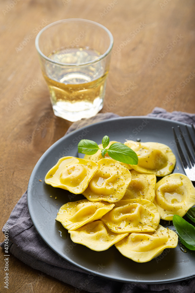 Boiled ravioli with fresh basil