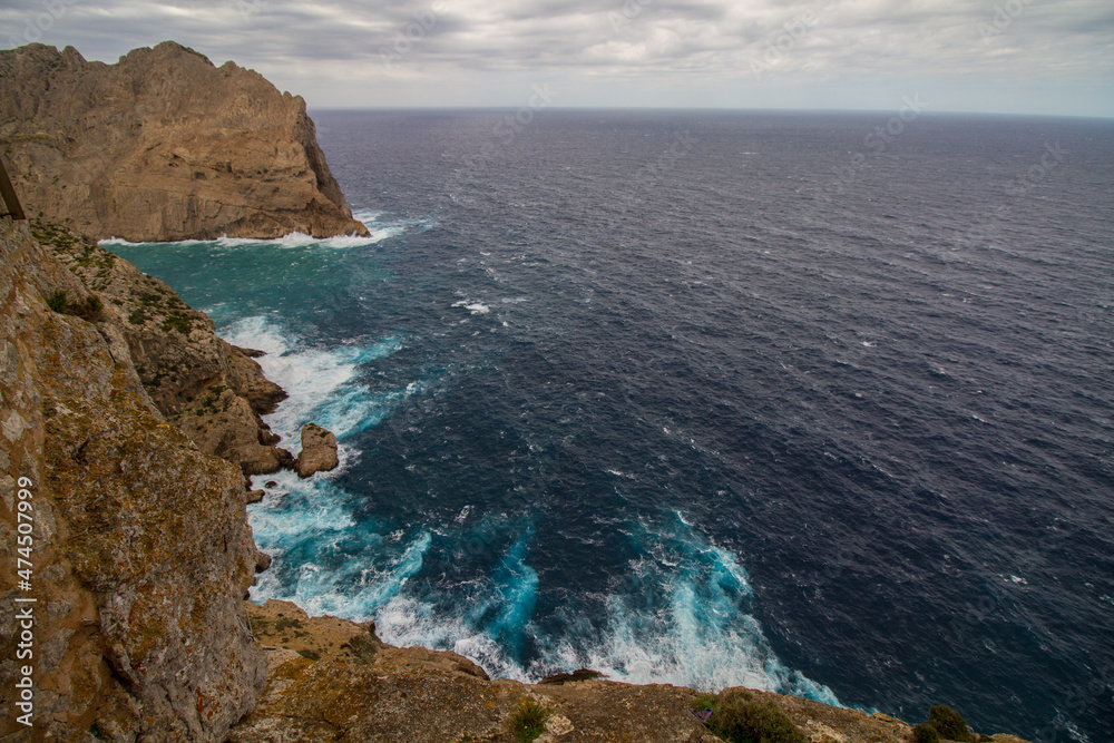 Cabo Formentor (Cape Formentor) at Mallorca, Spain, on a cloudy day in October, wild seascape, rough coastline, cliffs Cabo Formentor (Cape Formentor) at Mallorca, Spain, on a cloudy day in October, wild seascape, rough coastline, cliffs