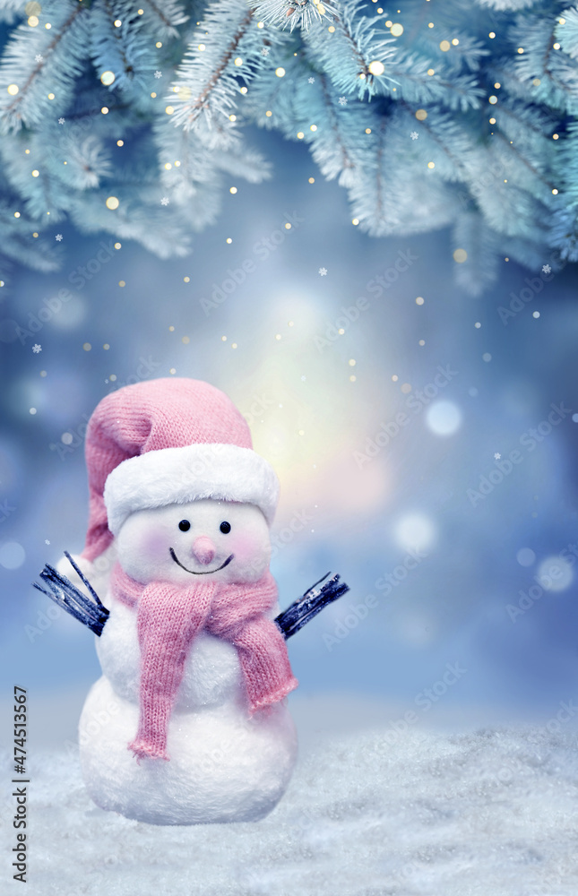 Cheerful snowman on the snow. Christmas background.