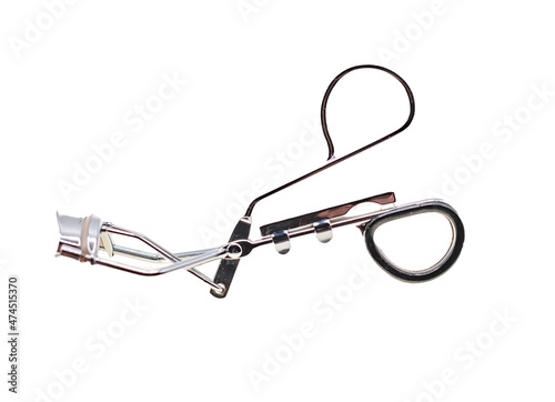 Norwich, Norfolk, UK – December 2021. A pair of eyelash curling tongs cut out isolated on a plain white background photo