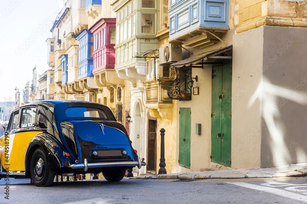 Classic car on the street of Valletta, Malta foto de Stock Adobe Stock