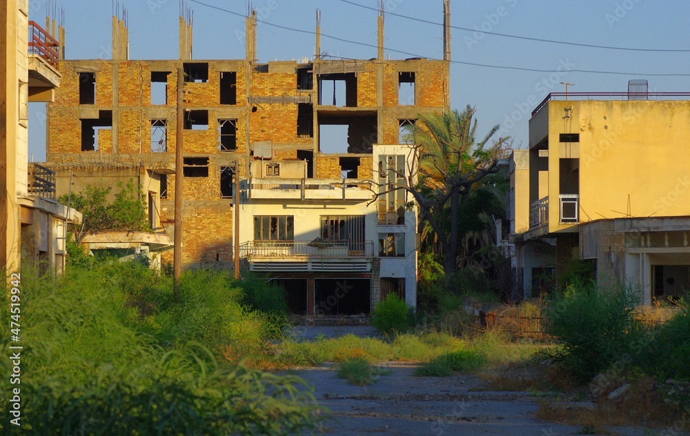 Fototapeta premium Varosha, once famous beach resort destination is now spooky ghost town, now only with few tourist and restricted beach .12.07.2021 Famagusta, Northern Cyprus